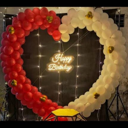 Heart shaped red and white birthday balloon decoration