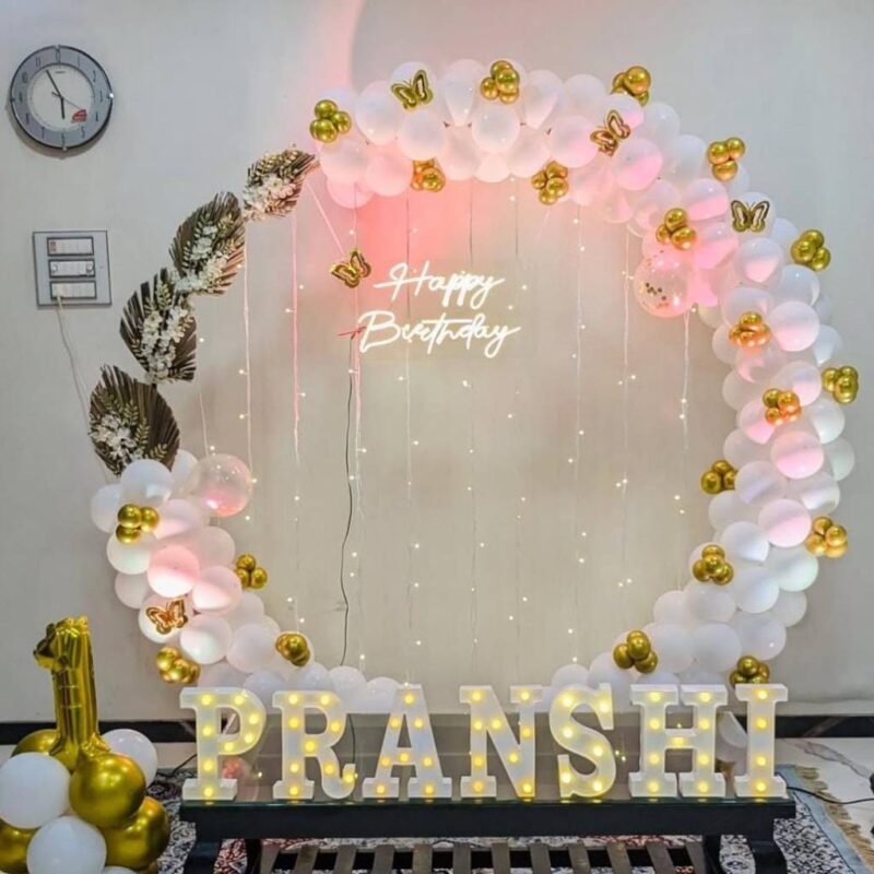 Rounded white and gold butterfly balloon arch